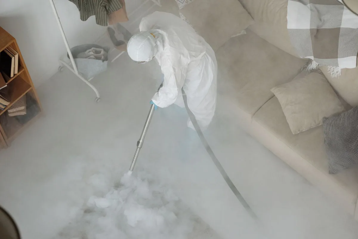 Biohazard cleanup technician in protective equipment, Stillwater, NY